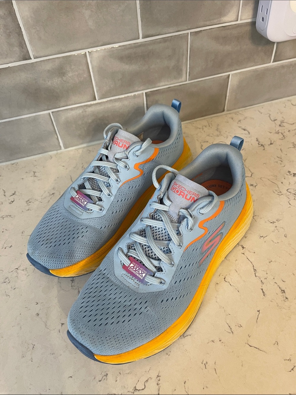 Skechers Light Blue Sneakers with Pink Logo and Yellow Midsole